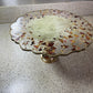 Cream, gold and clear, with rose petals and good flakes Irregular Round Pedestal Resin Cake Stand